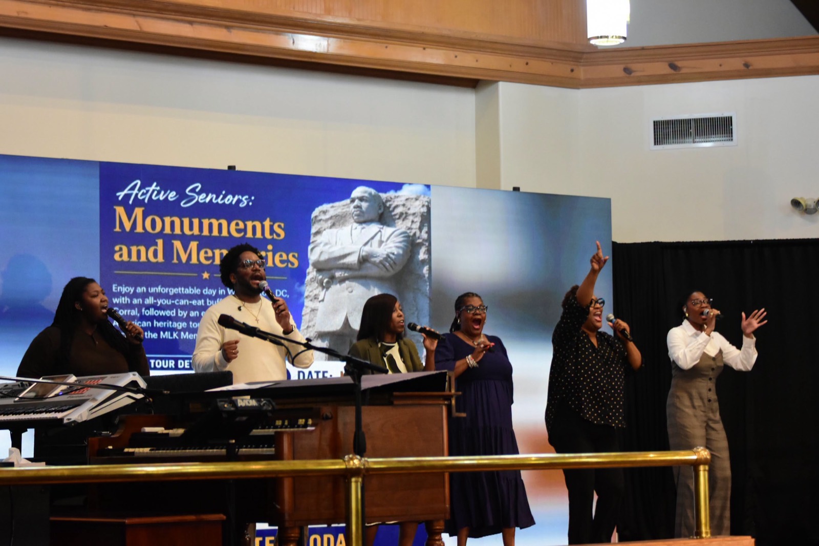 Worship leaders and musicians lead praise at an Active Seniors gathering.